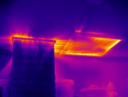 During warm-weather, hot air infiltration can be detected when depressurizing a building using a blower door. Contrary to what many might think, IR can still be used quite successfully in warm weather conditions.