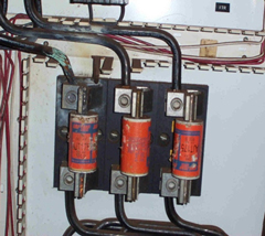 High Resistance Line side of fuse. Note heat damage to connection and adjacent phase cabling above.