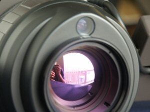 What appears to be a visually reflective surface on this IR camera lens is actually a very important thermally non-reflective coating that is critical to the radiometric capabilities of the imager.