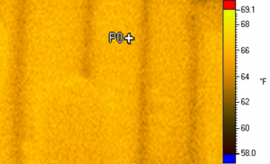 These two images of the interior surface of an exterior wall clearly demonstrate the effects of solar loading which can happen even in the winter. This first image (above), captured in the early morning in winter conditions, reveals a thermal pattern of insulated wall cavities.