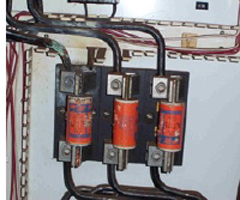 High Resistance Line side of fuse. Note heat damage to connection and adjacent phase cabling above.