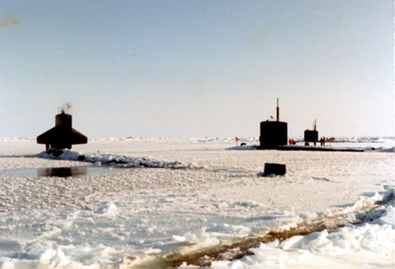 Don working on a submarine while in the Navy.